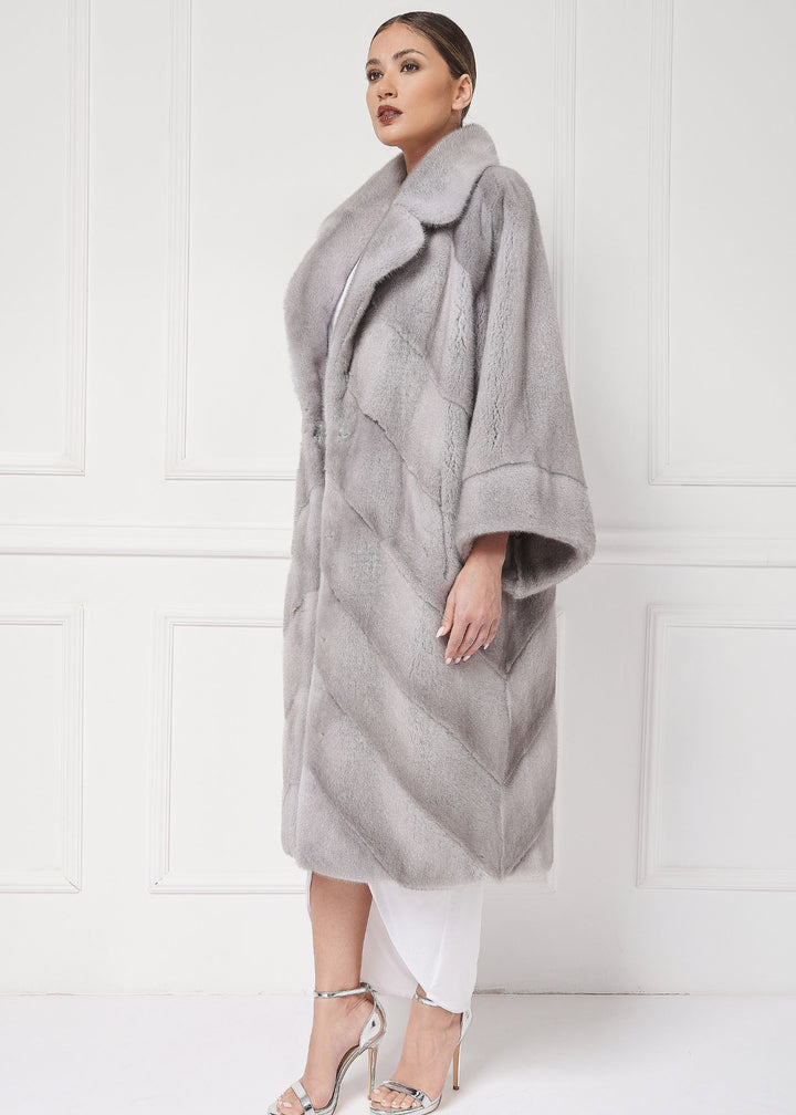 Mink coat with asymmetrical sleeves