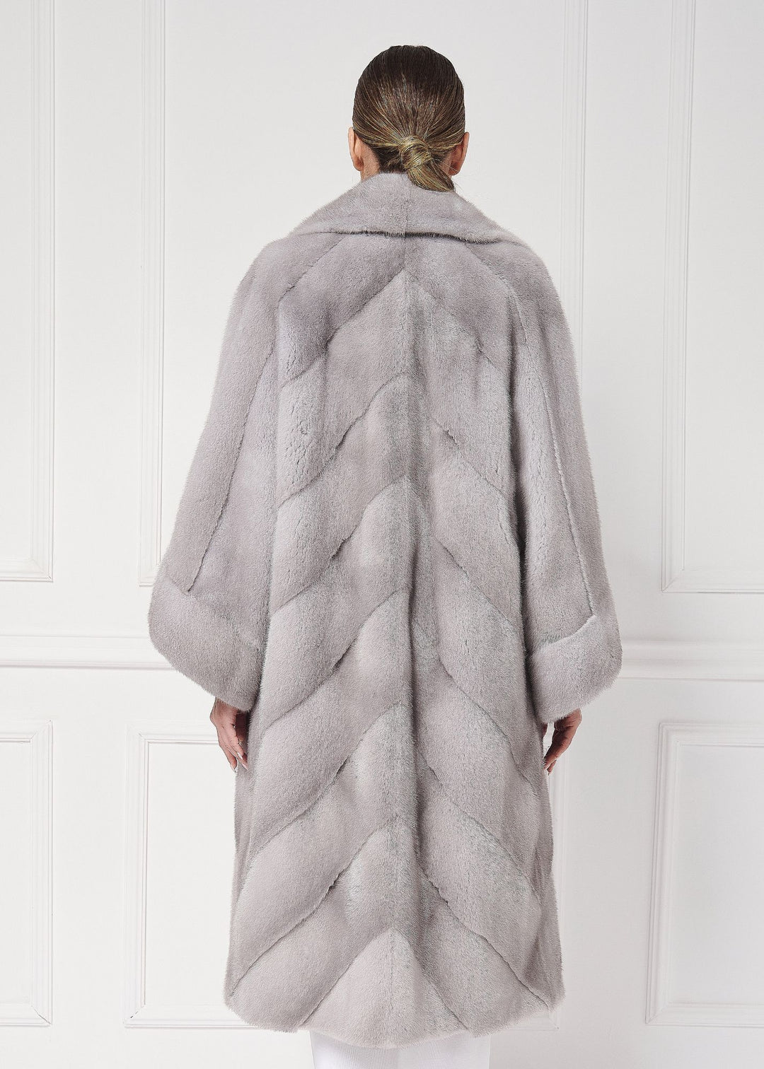 Mink coat with asymmetrical sleeves