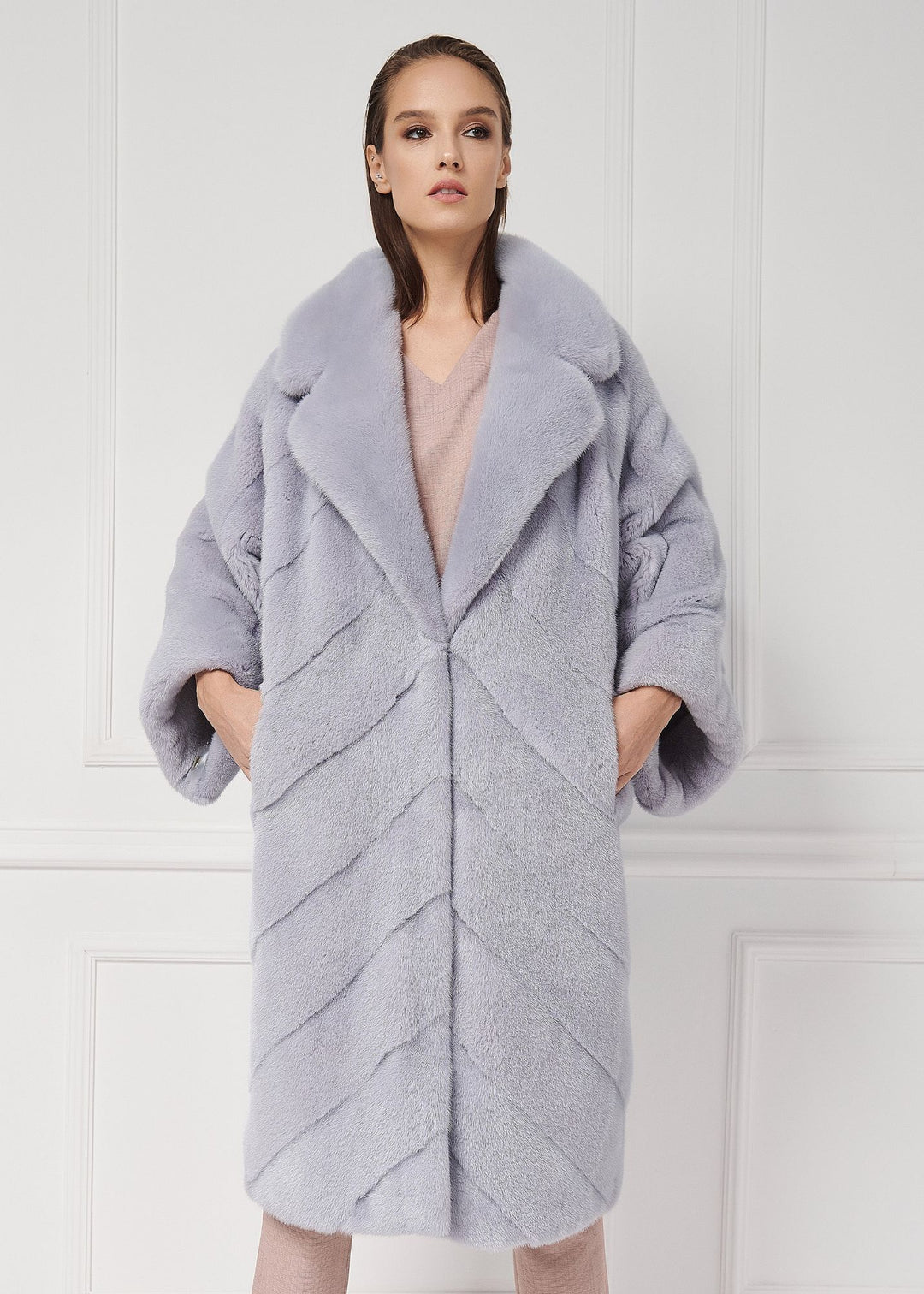 Mink coat with asymmetrical sleeves