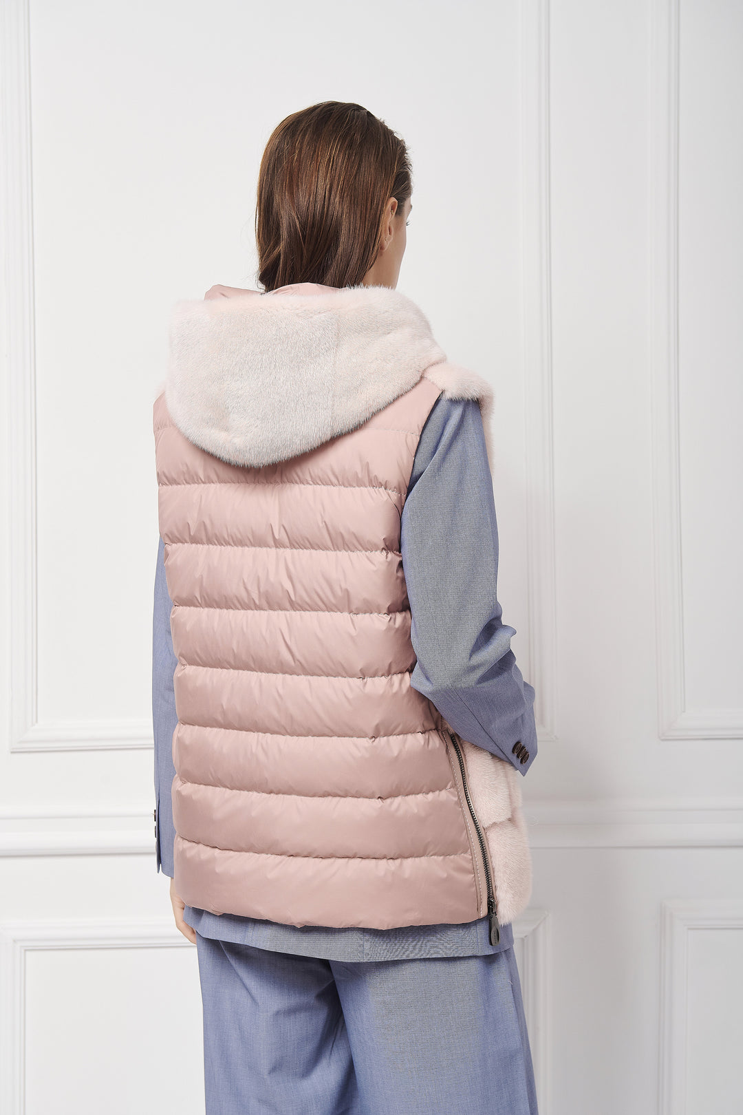 Sporty hooded down vest with mink