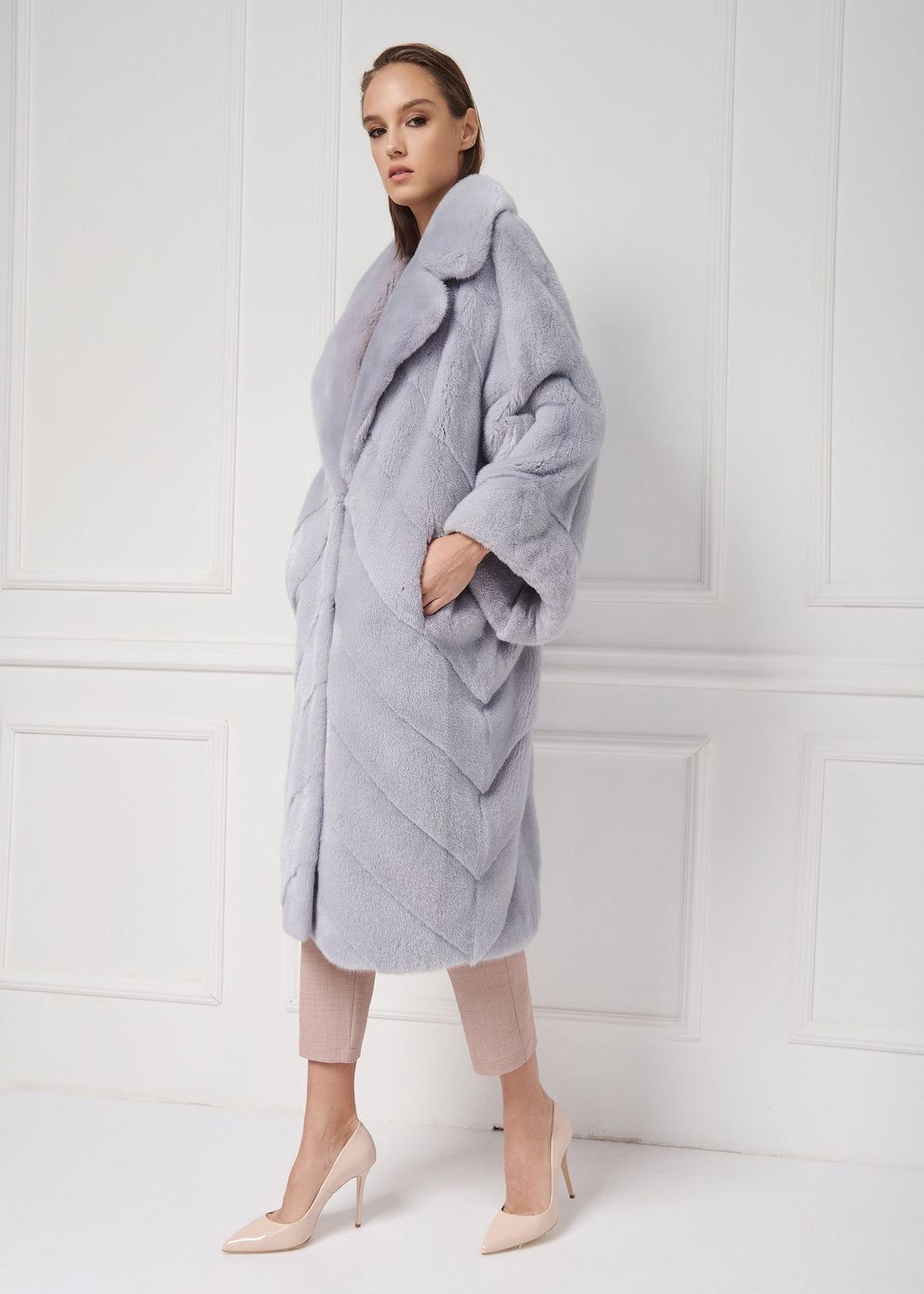 Mink coat with asymmetrical sleeves