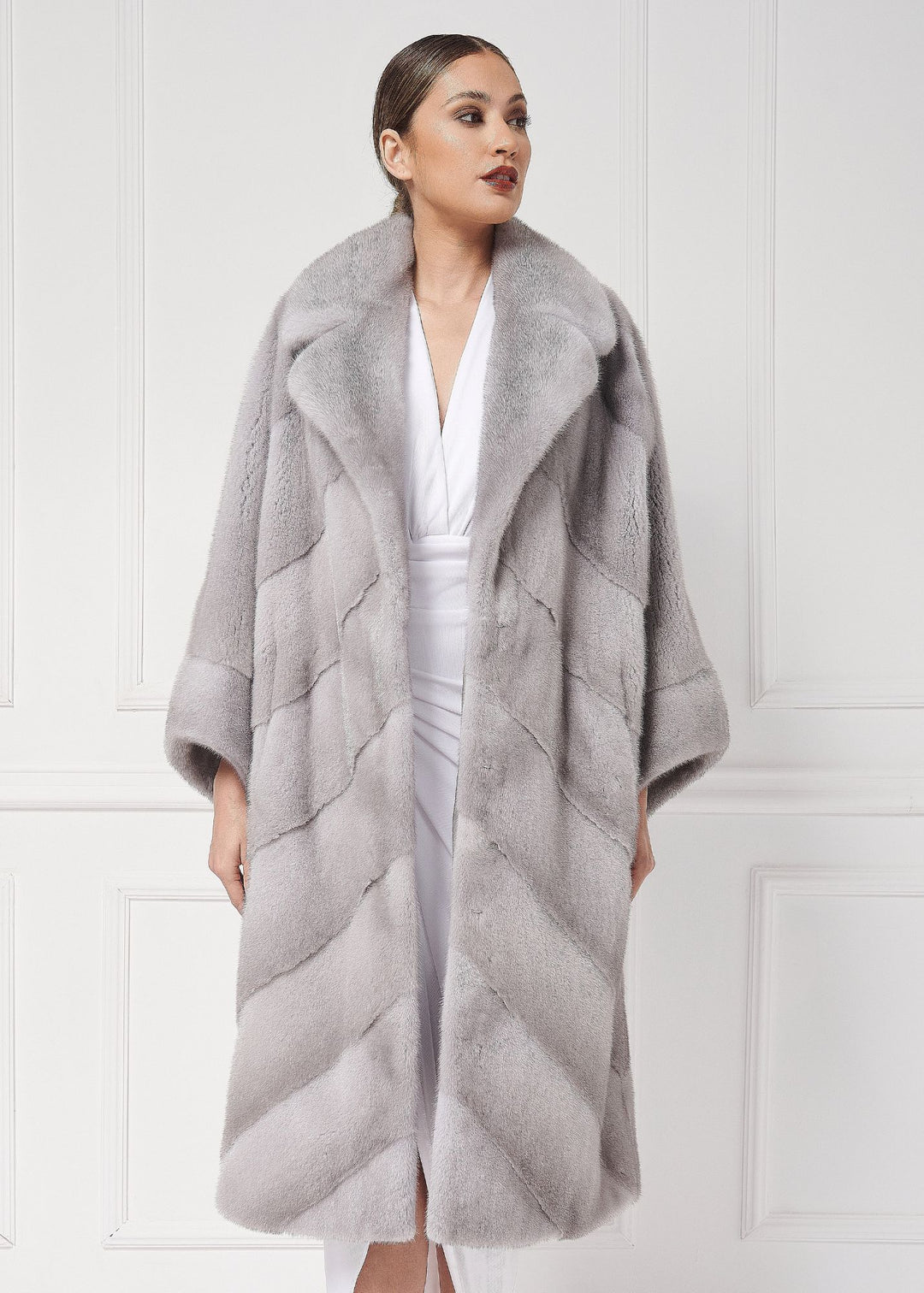 Mink coat with asymmetrical sleeves