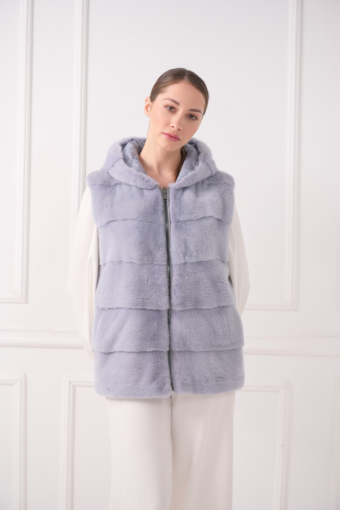 Hooded down vest with mink